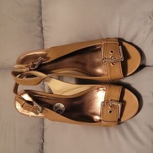Nine west wedge platform sandals in tan and brown.  Size 9.5.